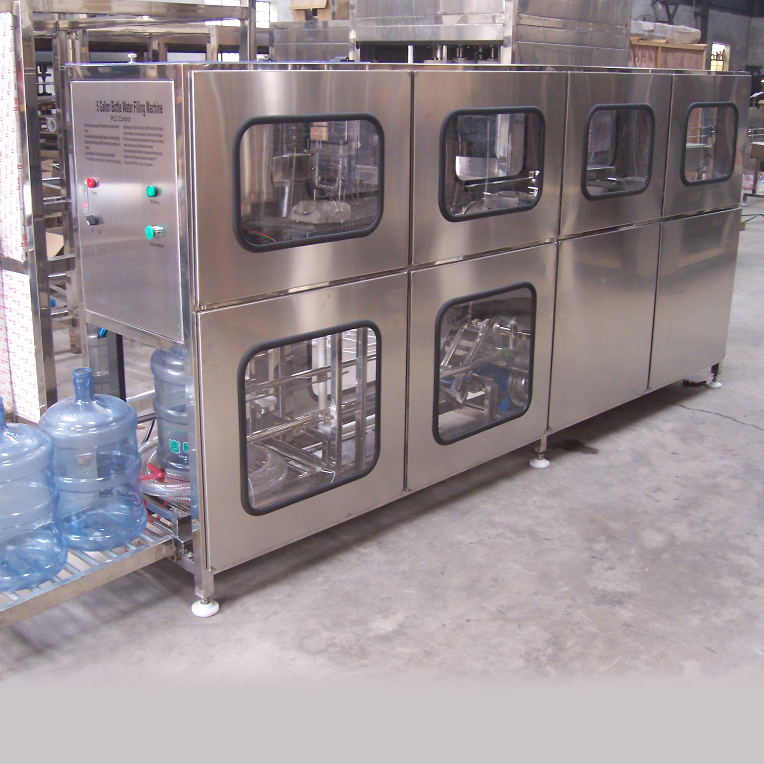 Machine de remplissage de bouteilles d'eau de 5 gallons - RO AGUA